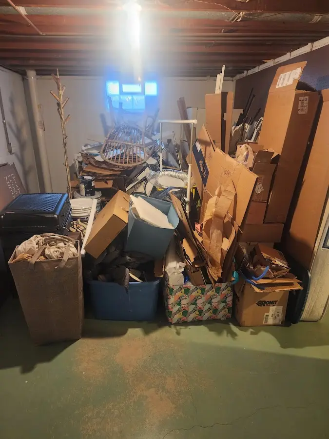 Roll-off dumpster container at job site for 20 Yard Dumpster Rental in Winder